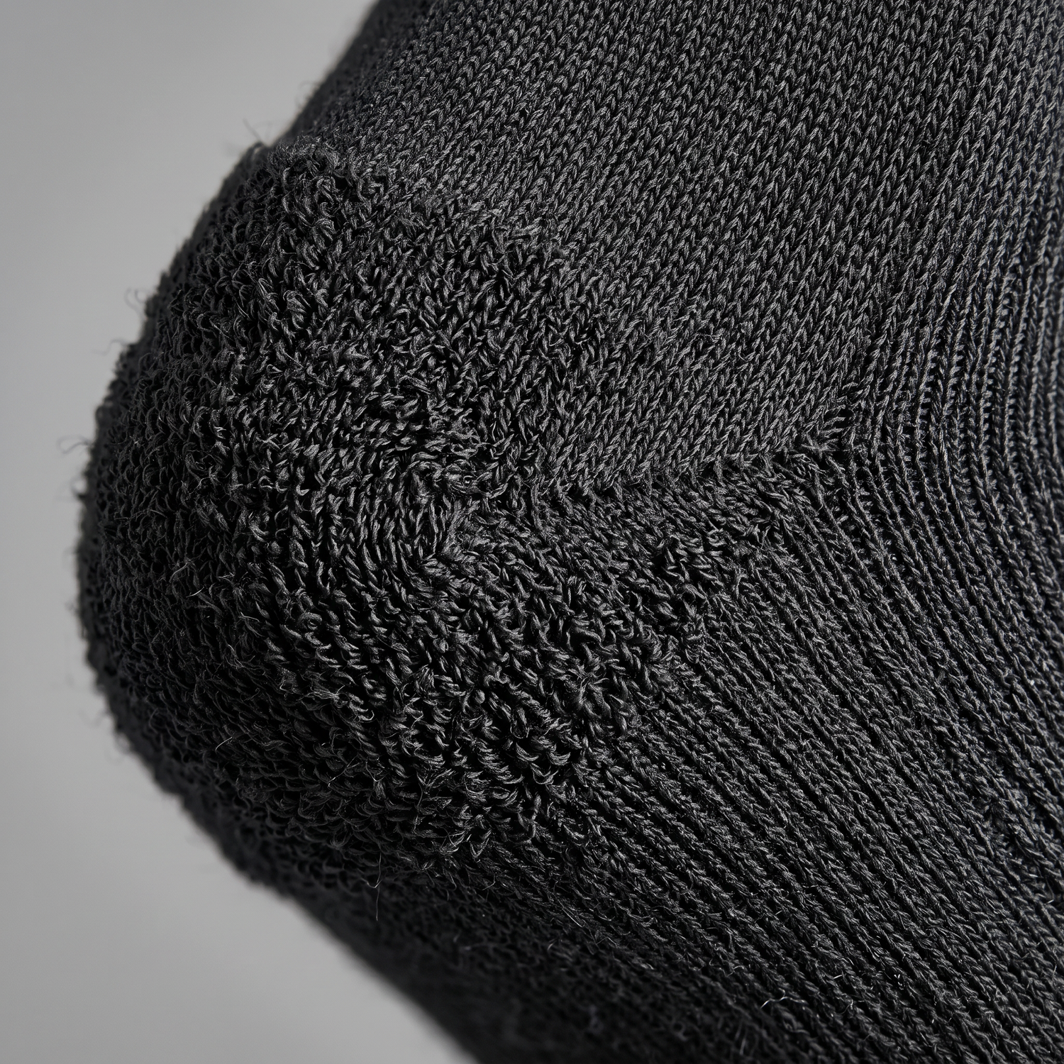 Macro du talon et de la pointe renforcés de la chaussette
