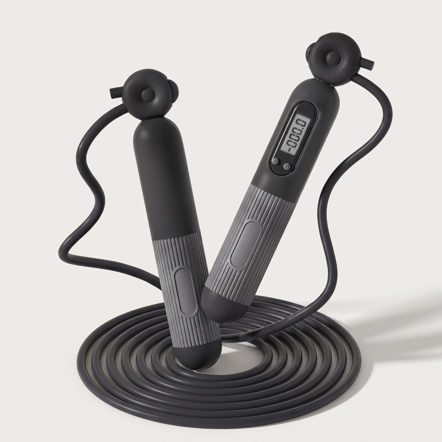 Corde à sauter digitale noire, deux poignées avec compteur LCD et câble enroulé