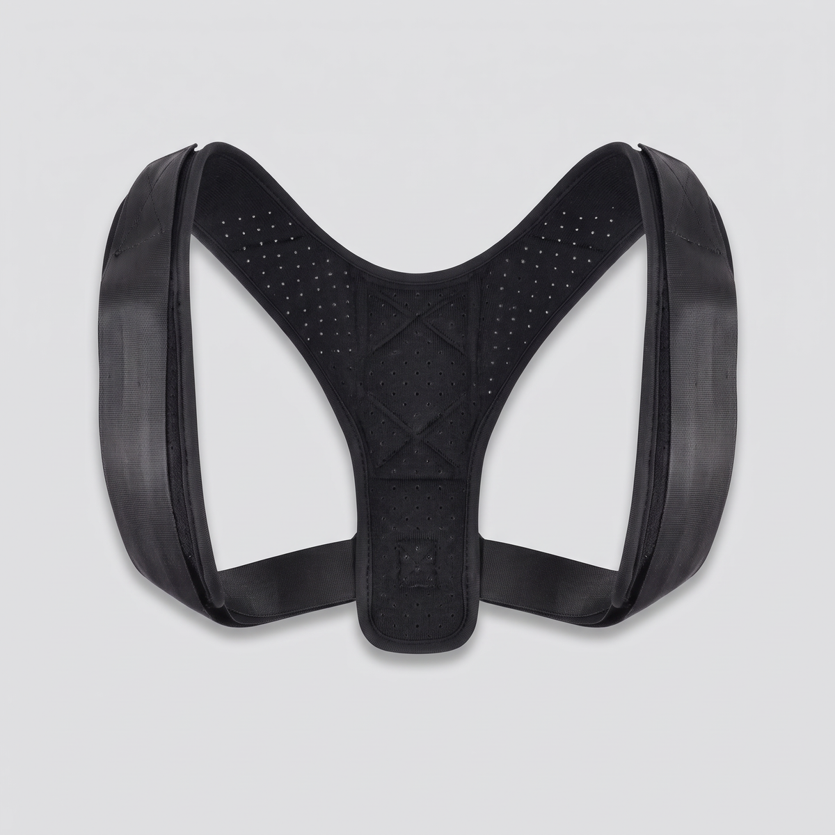 Correcteur de posture léger noir à plat, panneau dorsal ajouré et bretelles rembourrées