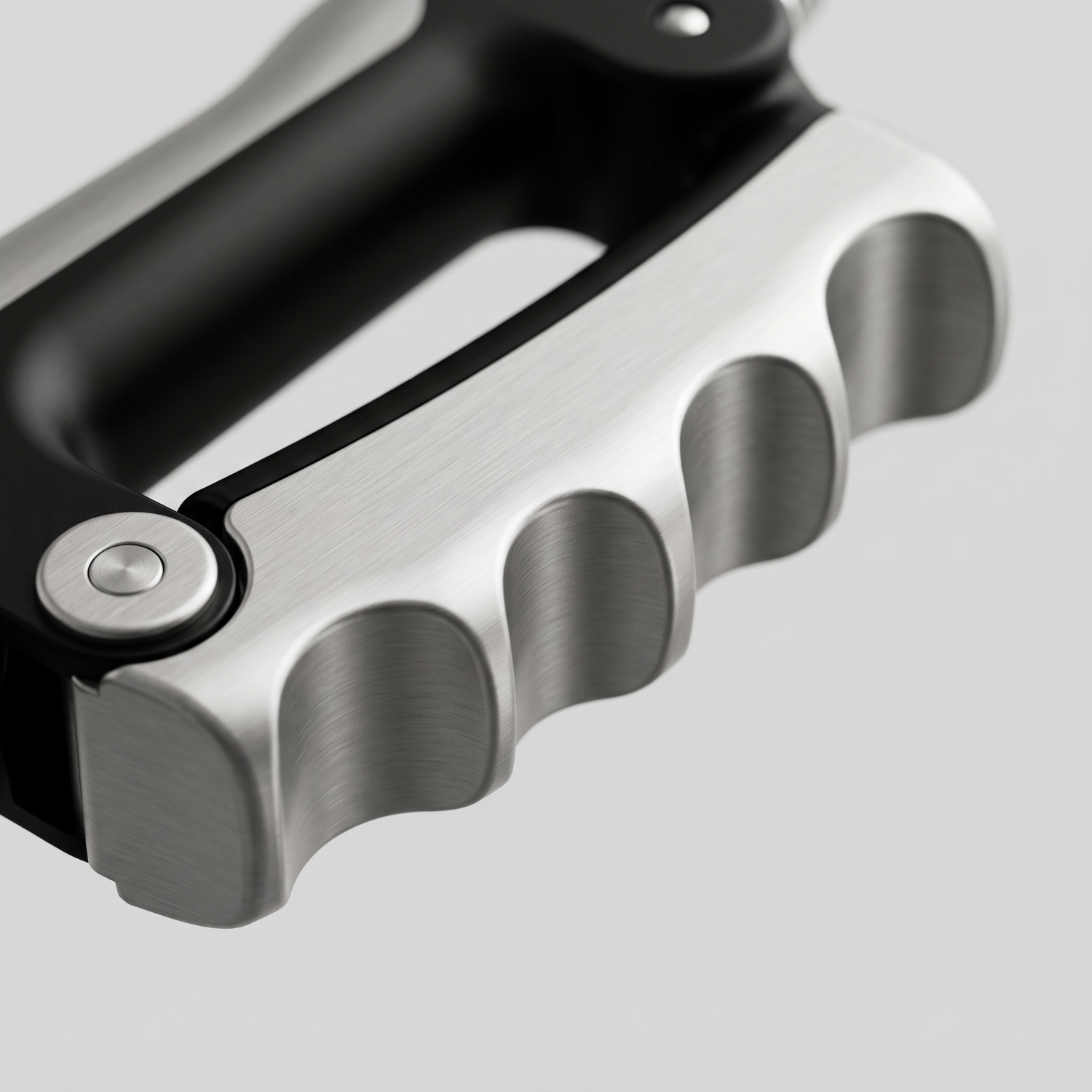 Détail de la barre inférieure du gripper avec ses quatre alvéoles ergonomiques pour les doigts
