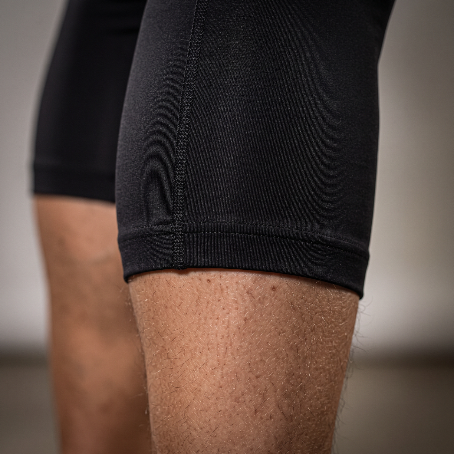 Collant de compression homme 3/4 — détail du tissu compressif
