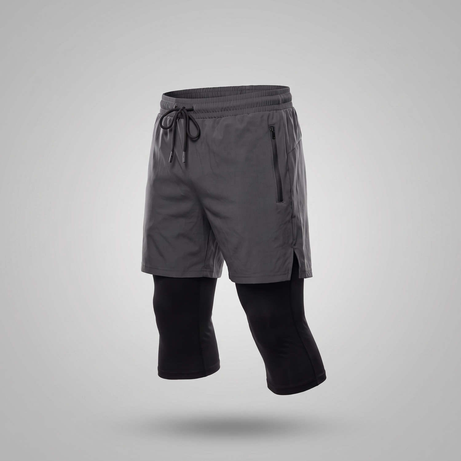Short running 2-en-1 legging intégré gris foncé — packshot studio