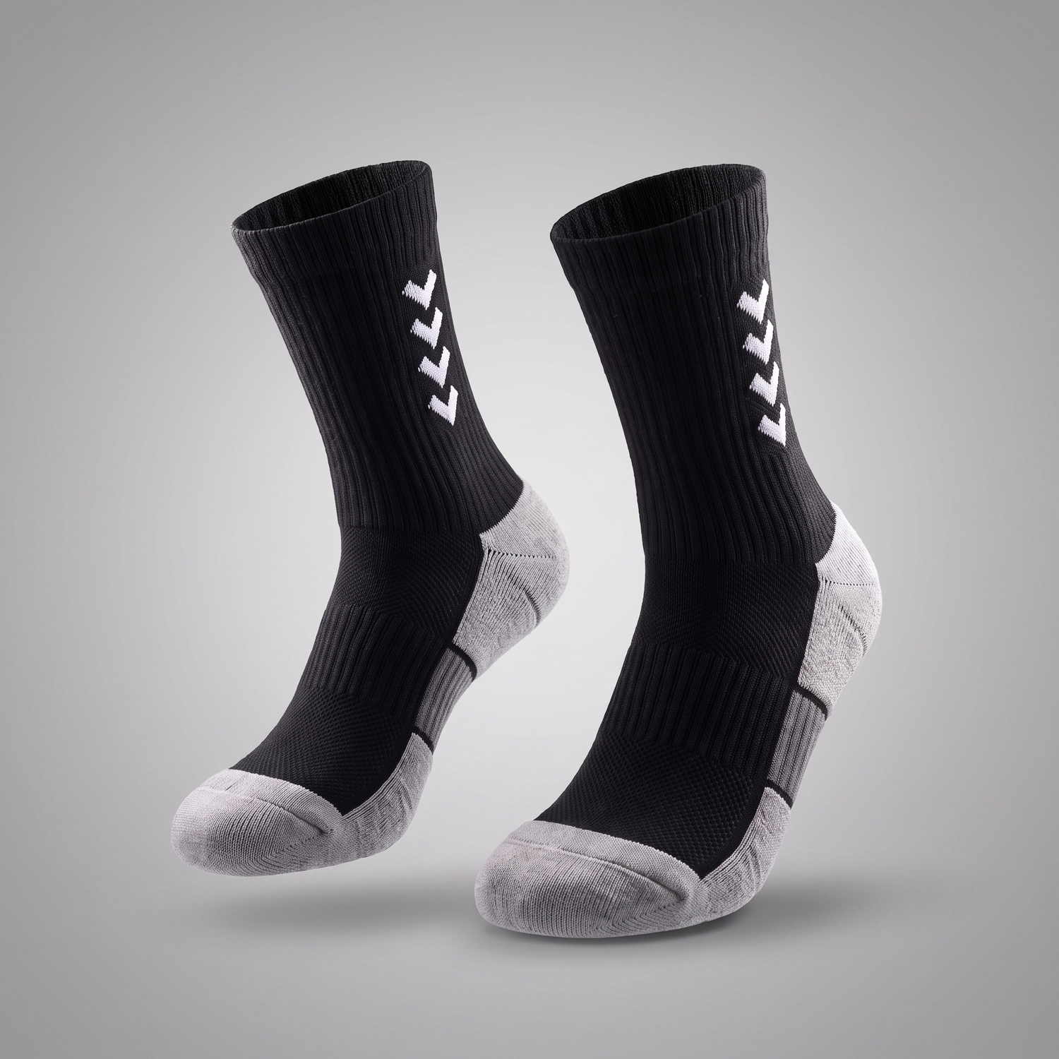 Chaussettes de compression running mi-mollet noir et gris — packshot studio