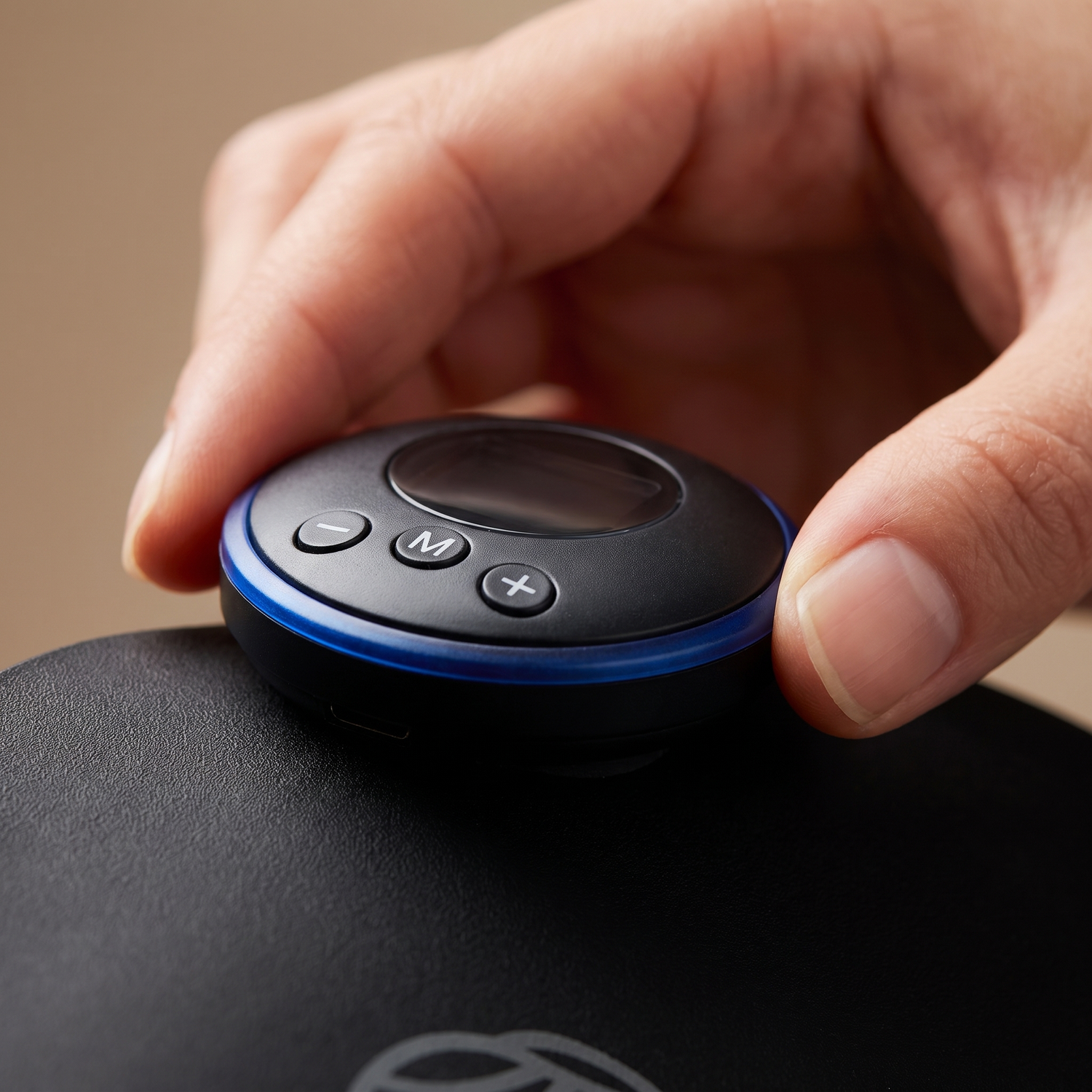 Détail de la télécommande sans fil et du module de commande du tapis de massage EMS
