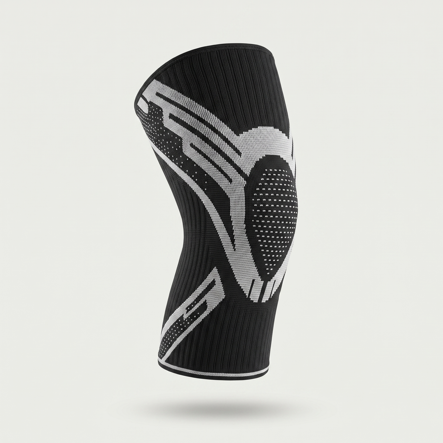 Manchon de genou compression Le Sport Français, coloris noir, tricot fermé avec zone rotulienne renforcée