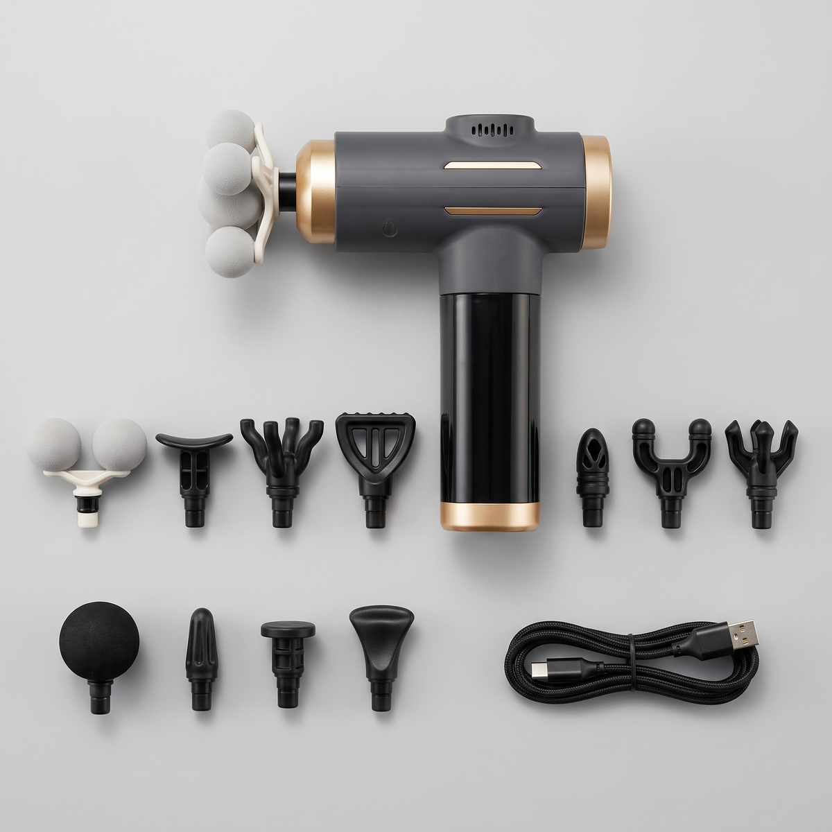 Kit complet du pistolet de massage avec ses 11 têtes et son câble de recharge