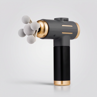 Pistolet de massage 11 têtes Le Sport Français noir et doré, packshot sur fond gris