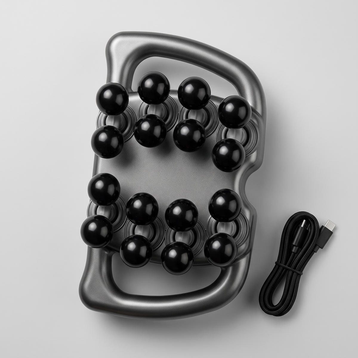 Pistolet de massage multi-têtes à plat avec son câble de recharge USB-C
