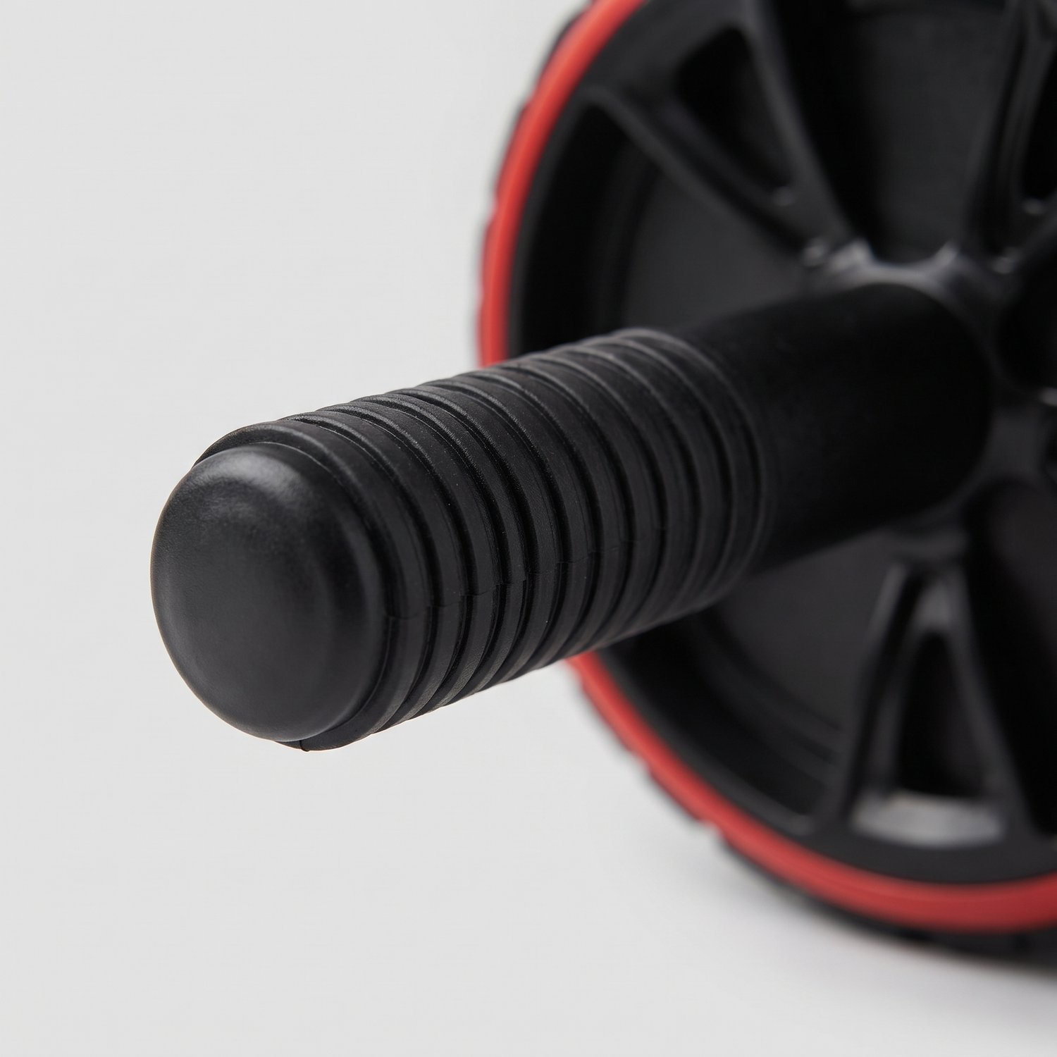 Macro d'une poignée cylindrique nervurée de la roue abdominale