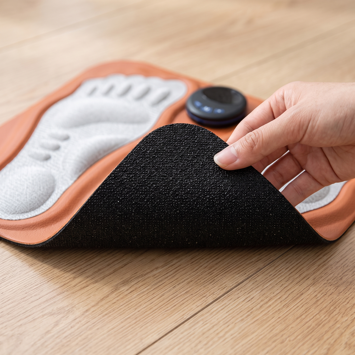 Dessous antidérapant en tissu granuleux noir du tapis de massage des pieds EMS